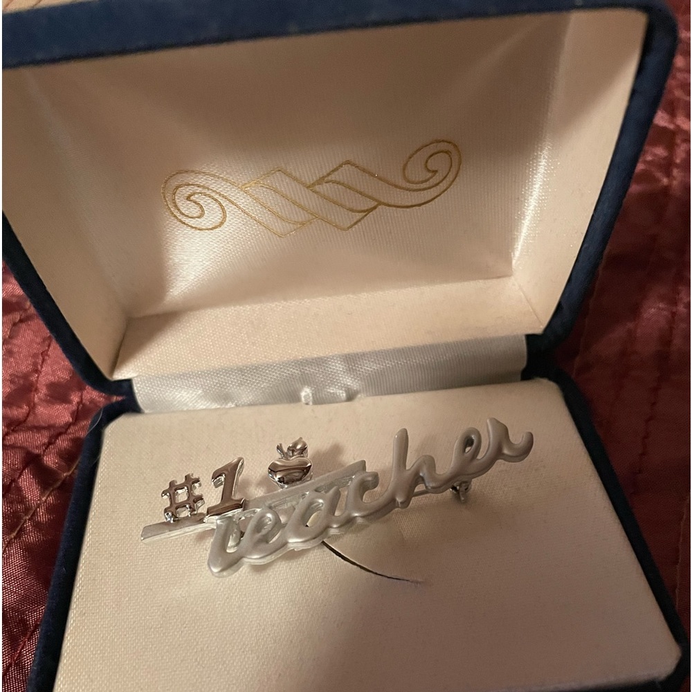 #1 teacher pin. New in box